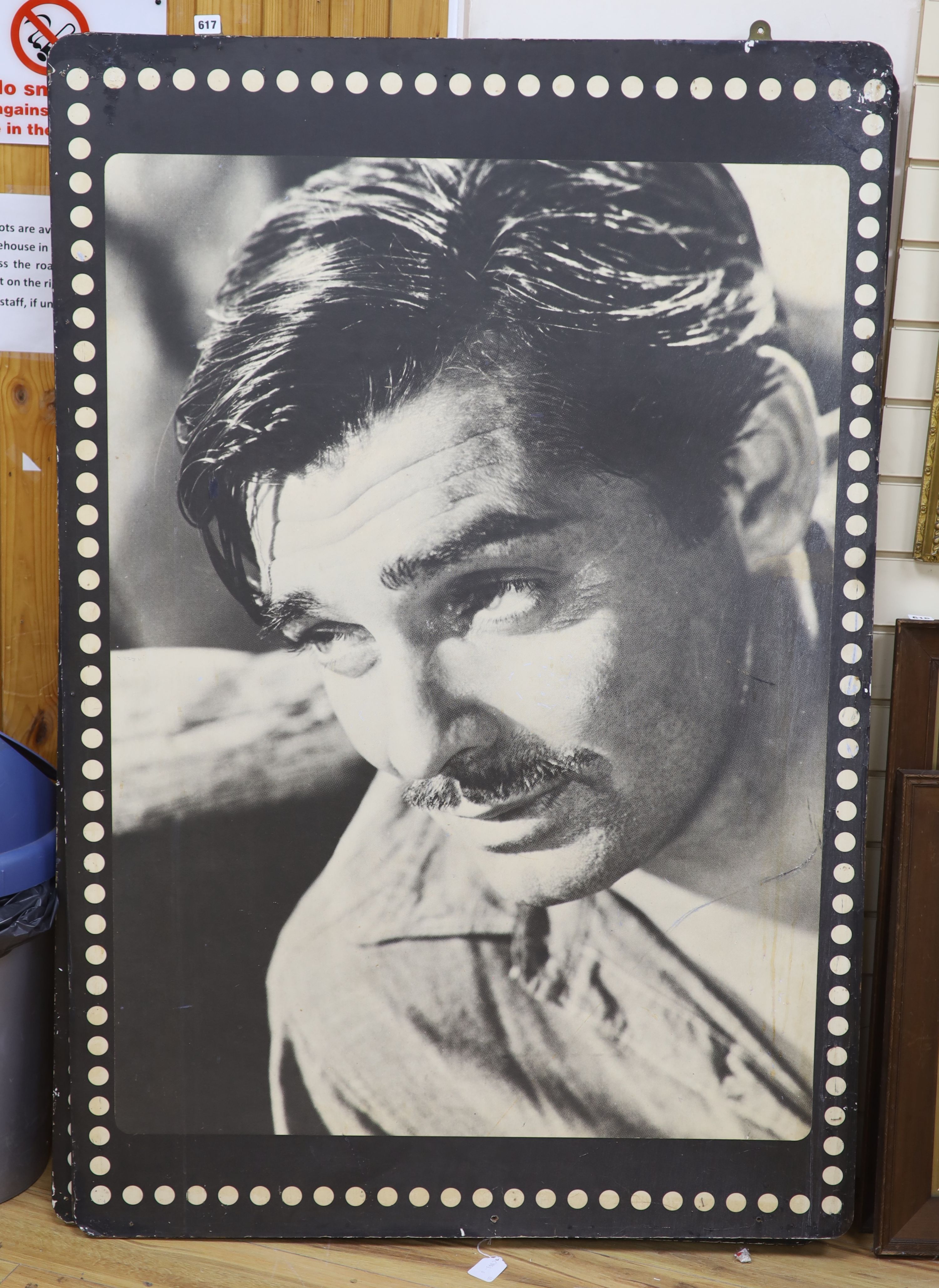 A pair of large printed black and white panels with portraits of Clarke Gable and Douglas Fairbanks Jnr., overall 153 x 102cm, unframed